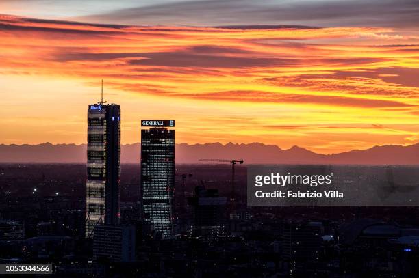 General view of Allianz tower and Generali tower at sunset on October 24, 2018 in Milan, Italy. The phenomenon is caused by the Föhn, a dry wind that...