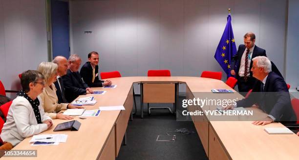 European Union's chief Brexit negotiator Michel Barnier meets with Scottish National Party's leader in the House of Commons Ian Blackford, Britain's...