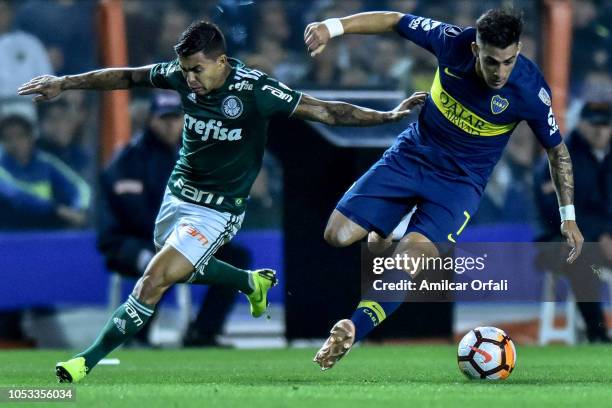 Cristian Pavon of Boca Juniors fights for the ball with Diego Barbosa of Palmeiras during the Semi Final first-leg match between Boca Juniors and...