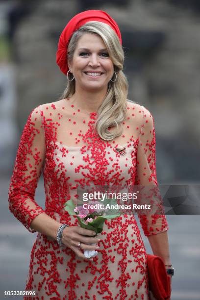 Queen Maxima of The Netherlands smiles upon her arrival at the Porta Nigra, a magnificent 2nd-century Roman city gate, on October 11, 2018 in Trier,...