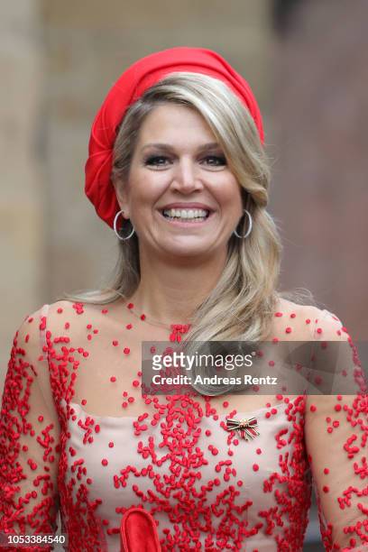 Queen Maxima of The Netherlands waves on her departure at the High Cathedral of Saint Peter in Trier on October 11, 2018 in Trier, Germany. King...