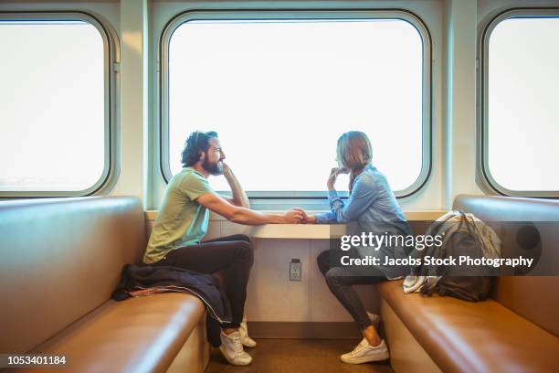 couple on ferry boat - imbarcazione per passeggeri foto e immagini stock
