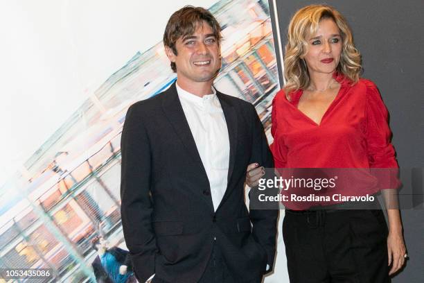 Italian actor Riccardo Scamarcio and Italian actress and director Valeria Golino attend "Euforia" photocall on October 25, 2018 in Milan, Italy.
