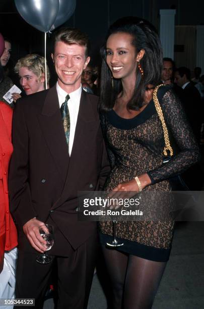 Iman and David Bowie during "7th On Sale" To Benefit AIDS Research - November 29, 1990 at 69th Regiment Armory in New York City, New York, United...
