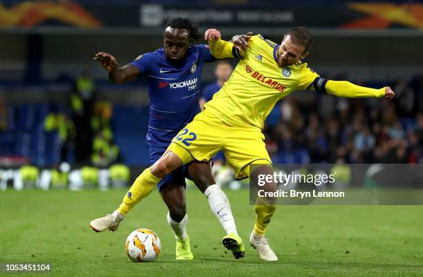 Igor Stasevich of FC BATE and Victor Moses of Chelsea in action during the UEFA Europa League Group L match between Chelsea and FC BATE Borisov at...