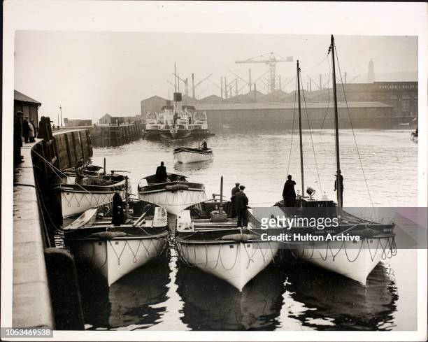 Some of the eleven lifeboats of the Cunard White Star liner 'Queen Mary' after their arrival at Albert Dock in Greenock, having left the yard of...