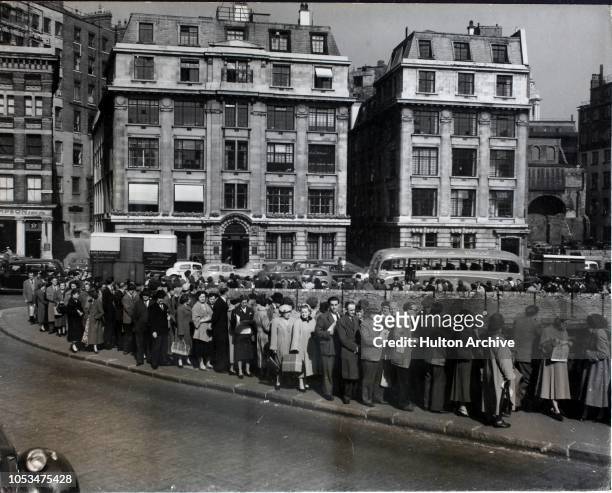 Section of the long queue forming for buses in Farringdon Avenue during a rail strike, with nose-to-tail traffic crawling past in Farringdon Street,...