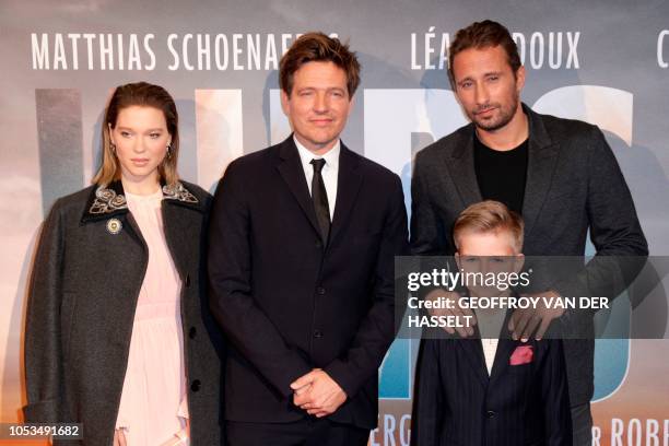 French actress Lea Seydoux, Danish film director Thomas Vinterberg, and Belgian actor Matthias Schoenaerts pose on the red carpet prior to the...