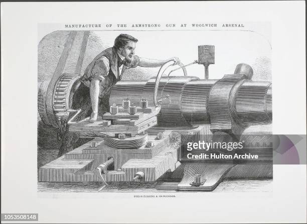 Worker finish-turning a 100 pounder during the manufacture of an Armstrong gun at Woolwich Arsenal, Woolwich, London, April 1862.