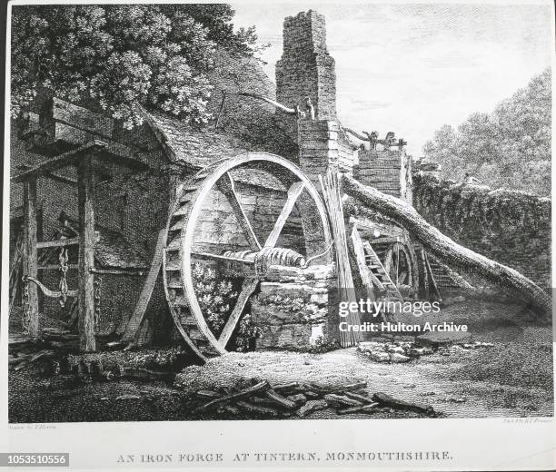 Waterwheel at a 17th century iron forge at Tintern, Monmouthshire, UK. Drawn by T. Hearne and etched by B. T. Pouncy. Published 1798.