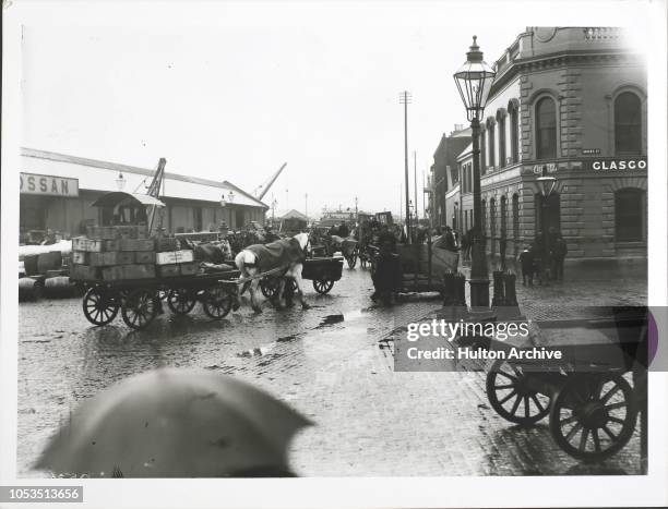 Resuming work at the docks after the Belfast strike and riots, August 1907.