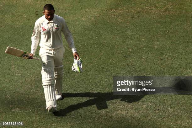Usman Khawaja of Australia walks from the ground at tea during day five of the First Test match in the series between Australia and Pakistan at Dubai...