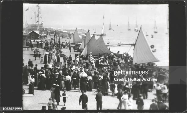 Sailing boats on the beach at Southsea, England, 1890s.