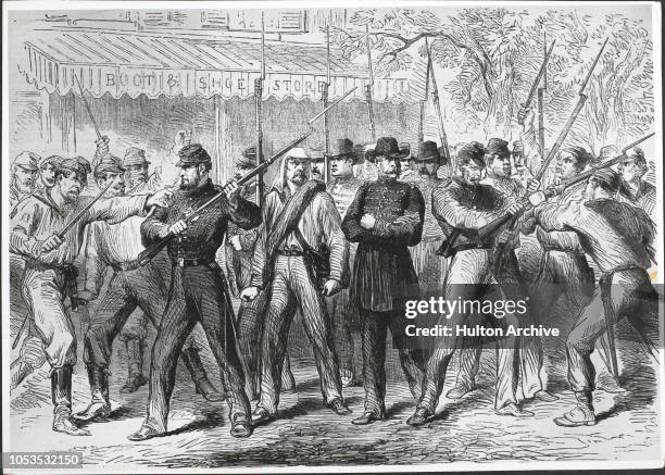 Soldiers of the Union Army attacking Confederate prisoners in the streets of Washington, during the American Civil War, 1861. From the Illustrated...