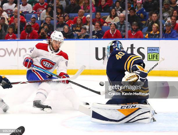 Carter Hutton of the Buffalo Sabres makes the save against Jonathan Drouin of the Montreal Canadiens during the first period at the KeyBank Center on...