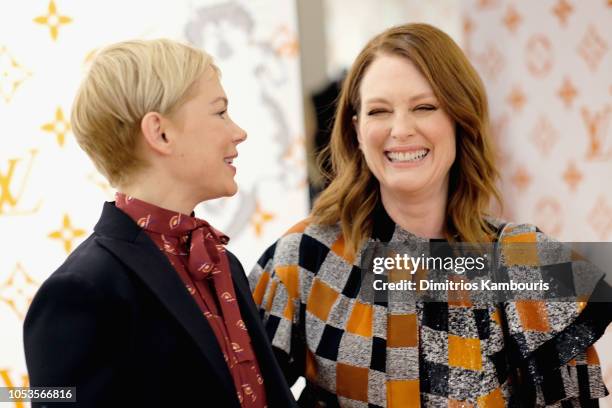 Julianne Moore and Michelle Williams attend the Louis Vuitton X Grace Coddington Event on October 25, 2018 in New York City.
