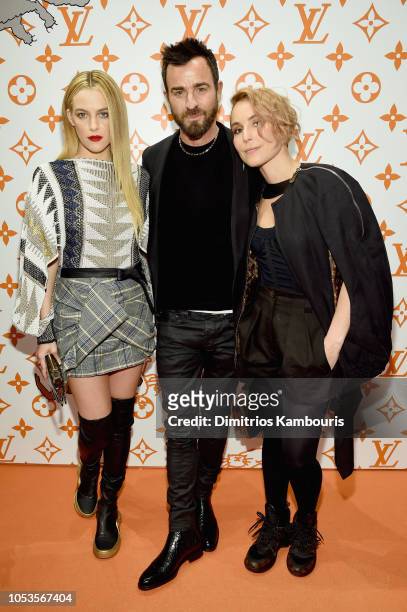 Riley Keough, Justin Theroux, and Noomi Rapace attend the Louis Vuitton X Grace Coddington Event on October 25, 2018 in New York City.
