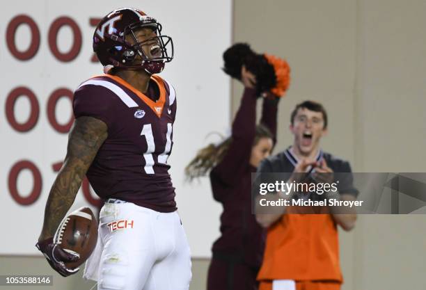 Wide receiver Damon Hazelton of the Virginia Tech Hokies reacts following his touchdown reception against the Georgia Tech Yellow Jackets in the...