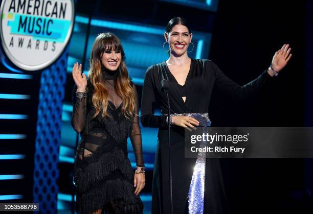 Hanna Nicole Perez Mosa and Ashley Grace Perez Mosa of Ha*Ash speak onstage during the 2018 Latin American Music Awards at Dolby Theatre on October...