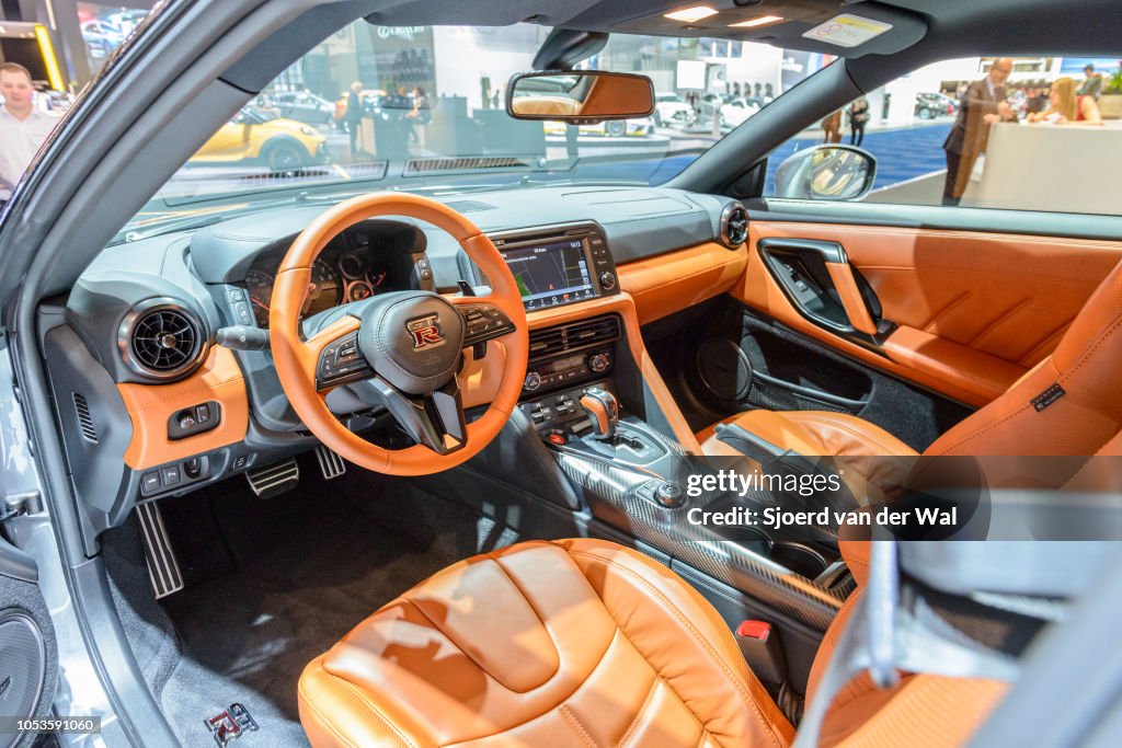 Interior on a Nissan GT-R high performance sports car with brown ...