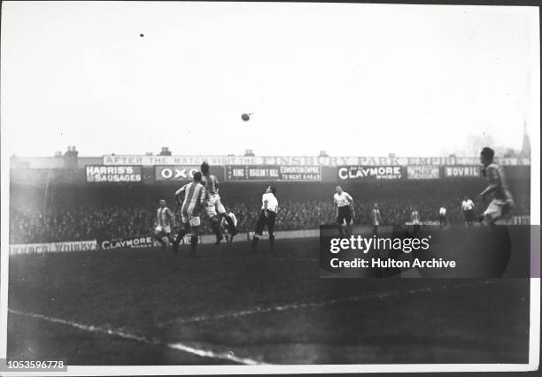 Tottenham Hotspur vs Oldham Athletic , Spurs use head well and clear.