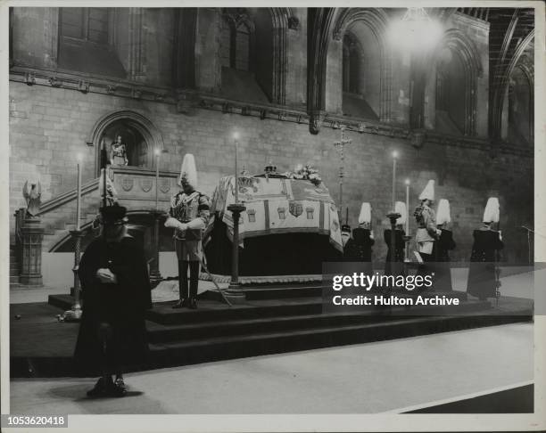 The coffin of King George V lies in state in Westminster Hall, London, January 1936.