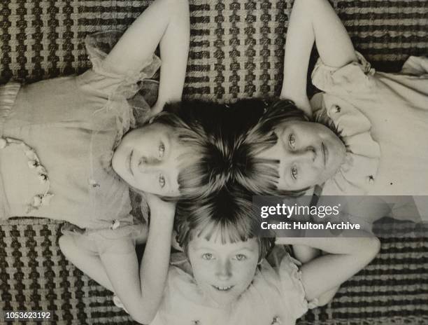 Three Of A Kind, Dorothy, Iris and Myra Tagg, 10 year old triplets of Leytonstone, have been a puzzle to the neighbours ever since they were born....