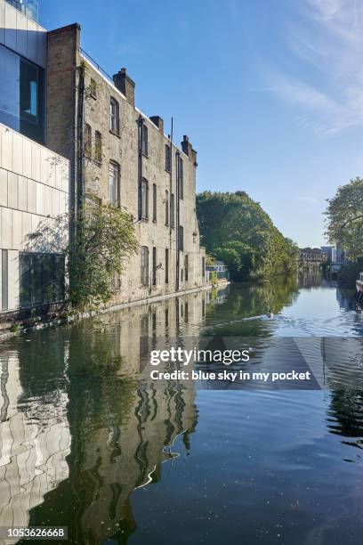 the contrast in architecture old an new on the paddington branch of the grand union canal, london, uk. - grand union canal stock pictures, royalty-free photos & images