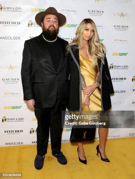 Austin "Chumlee" Russell from History's "Pawn Stars" television series and Olivia Rademann attends the Grant a Gift Autism Foundation's ninth annual...