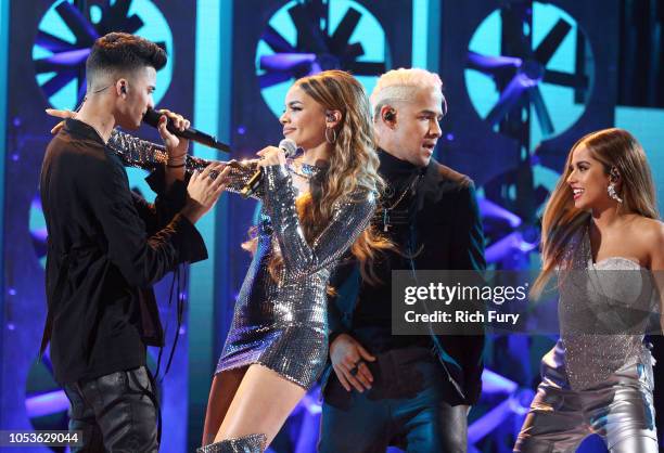 Erick Brian Colon of CNCO, Leslie Grace, Richard Camacho of CNCO, and Becky G perform onstage during the 2018 Latin American Music Awards at Dolby...