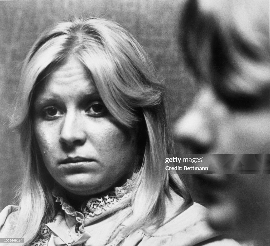 AS her daughter Tami listens, Trena McElroy retells how she watched