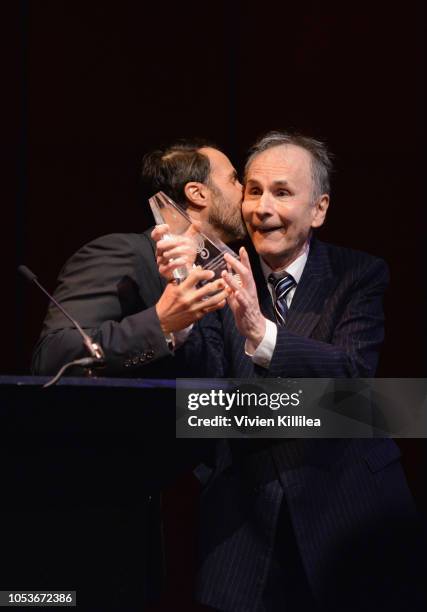 Ben Silverman and Stanley Silverman speak onstage during the American Friends of the Israel Philharmonic Orchestra Los Angeles Gala 2018 at Wallis...