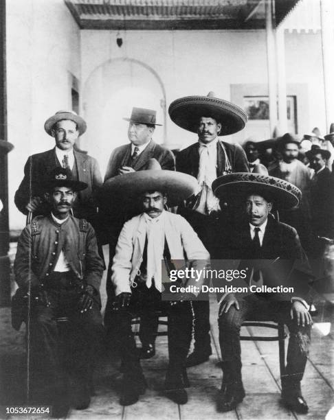 Benjamin Argumedo, Emiliano Zapata and Manuel Palafox. Standing: Ignacio Ocampo, George Carothers and Amador Salazar in Xochimilco after Zapatas...