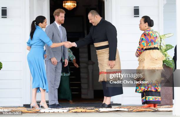 Prince Harry, Duke of Sussex and Meghan, Duchess of Sussex Standing with King Tupou VI and Queen Nanasipau'u Tuku'aho of Tonga at the farewell with...