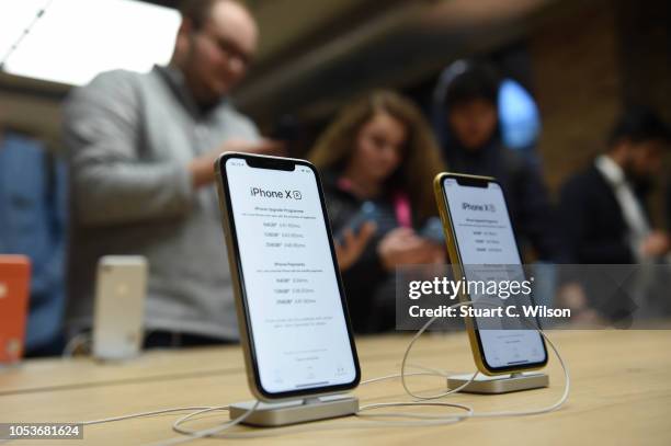 General view of customers at the Apple Covent Garden re-opening and iPhone XR launch at Apple store, Covent Garden on October 26, 2018 in London,...