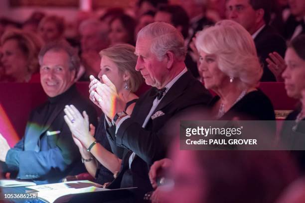 Britain's Prince Charles, Prince of Wales and his wife Britain's Camilla, Duchess of Cornwall during a gala concert in the Throne Room at Buckingham...