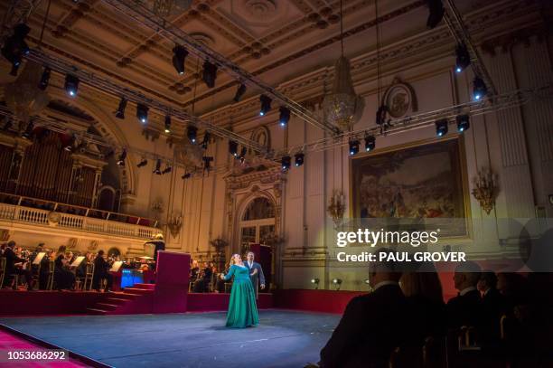 Emily Magee and Stuart Skelton performing during a gala concert in the Throne Room at Buckingham Palace in London on October 25 to mark 70th birthday...