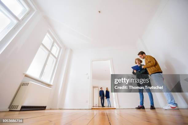 Posed scene on the topic of housing inspection. People are looking at a rental apartment on October 25, 2018 in Berlin, Germany.