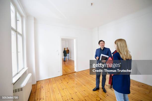 Posed scene on the topic of housing inspection. People are looking at a rental apartment on October 25, 2018 in Berlin, Germany.