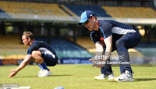 England captain Eoin Morgan catches during a nets session at R. Premadasa Stadium on October 26, 2018 in Colombo, .