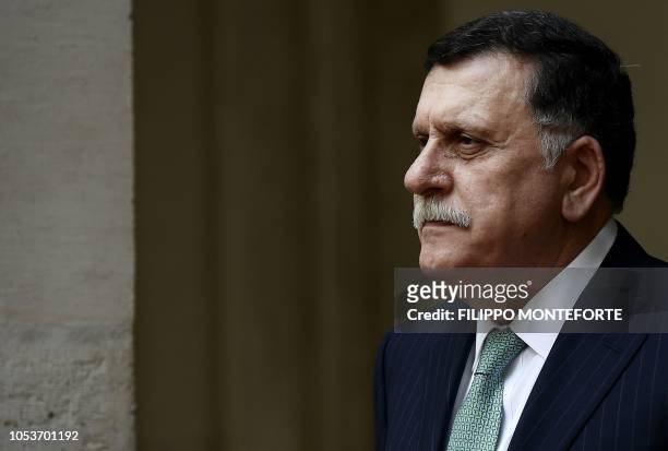 Libyan Prime Minister Fayez al-Sarraj looks on before a meeting with his Italian counterpart Giuseppe Conte at the Palazzo Chigi in Rome on October...