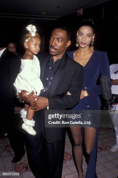 Eddie Murphy, his daughter Brea and Nicole Mitchell