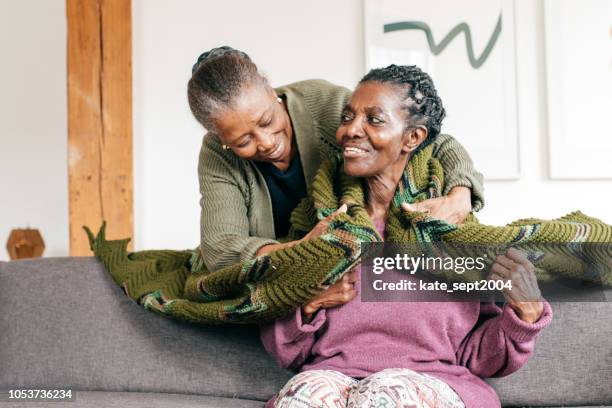 mother and daughter - dementia father stock pictures, royalty-free photos & images