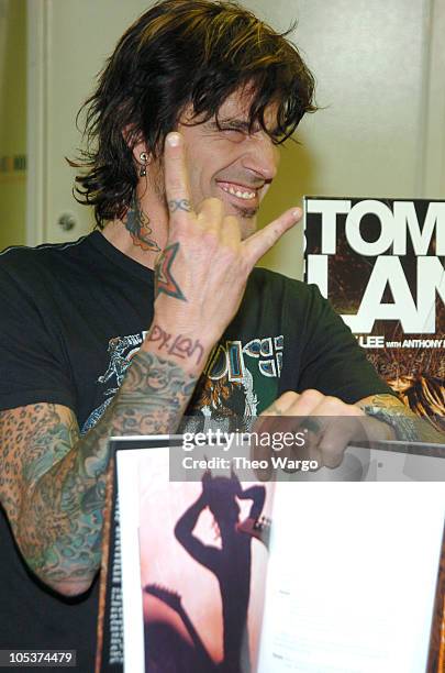 60 Tommy Lee Signs Copies Of His New Book Tommy Land Photos & High Res ...