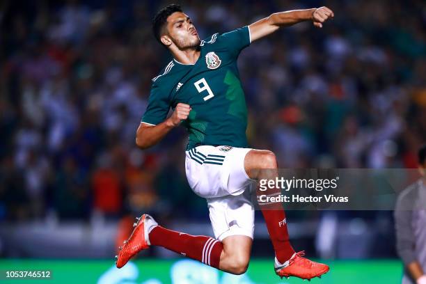 Raul Jimenez of Mexico celebrates after scoring the third goal of his team during the international friendly match between Mexico and Costa Rica at...