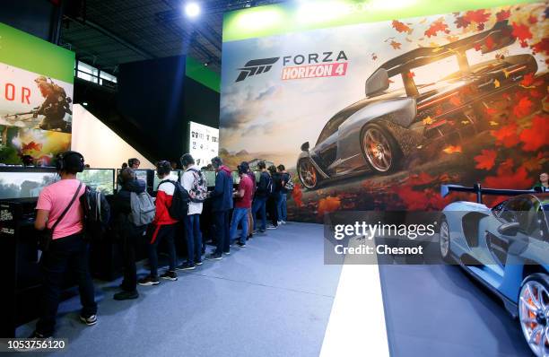 Poster of the video game 'Forza Horizon 4' developed by Playground Games and published by Microsoft Studios is displayed during the 'Paris Games...