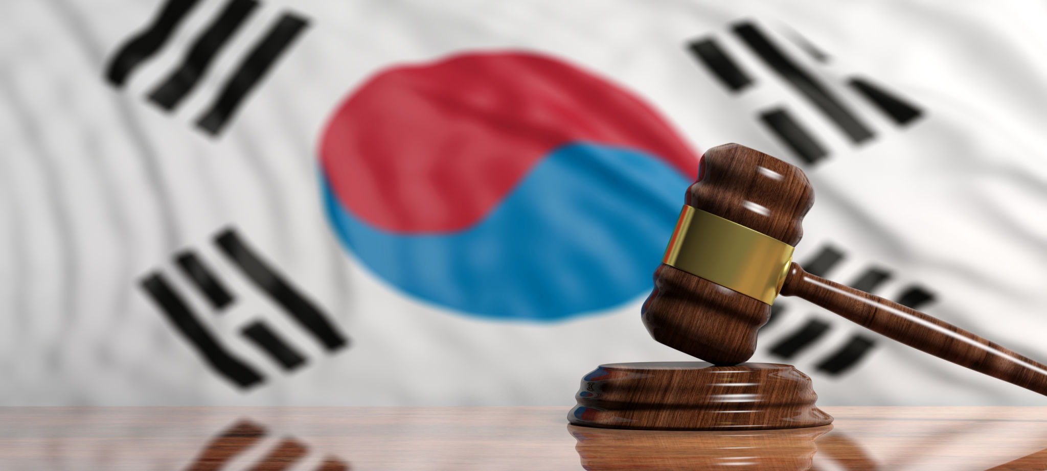 Judge or auction gavel on South Korea flag background. 3d illustration Judge or auction gavel on South Korea flag background. 3d illustration
