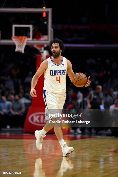 Milos Teodosic of the Los Angeles Clippers dribbles the ball during the game against the Denver Nuggets on October 9, 2018 at STAPLES Center in Los...