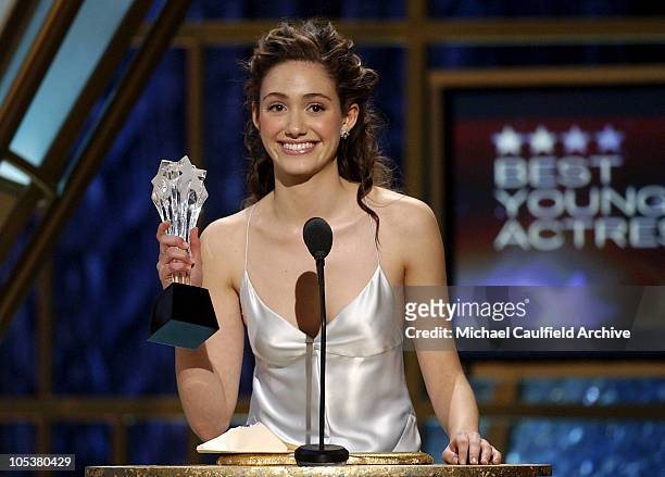 Emmy Rossum accepts the Best Young Actress Award for her role in "The Phantom of the Opera"