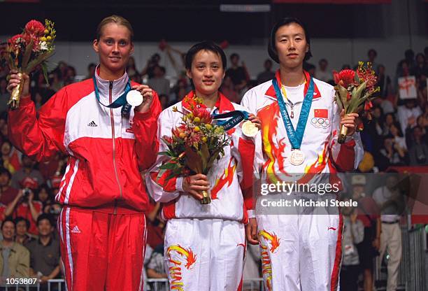 Zhichao Gong of China wins Gold, Camilla Martin of Denmark Wins Silver and Zhaoying Ye of China wins Bronze in the Womens Singles Badminton Finals at...